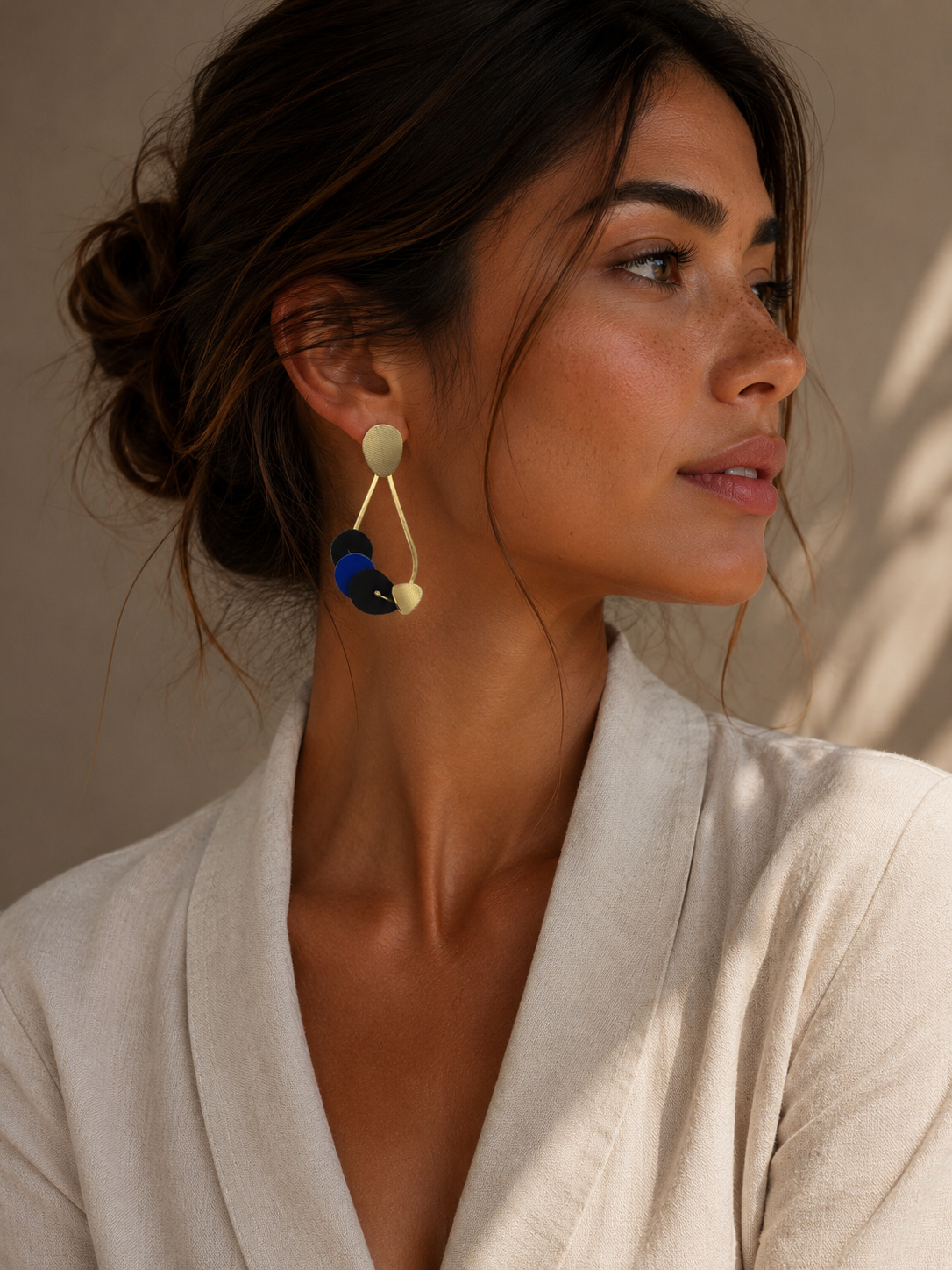 Leather teardrop gold earrings blue and black