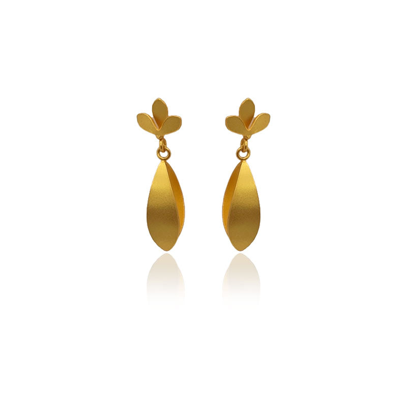 Pair of Iris golden earrings on a white background