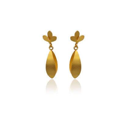 Pair of Iris golden earrings on a white background