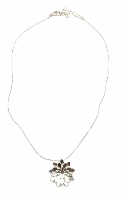 Necklace with a loto floral pendant on a white background