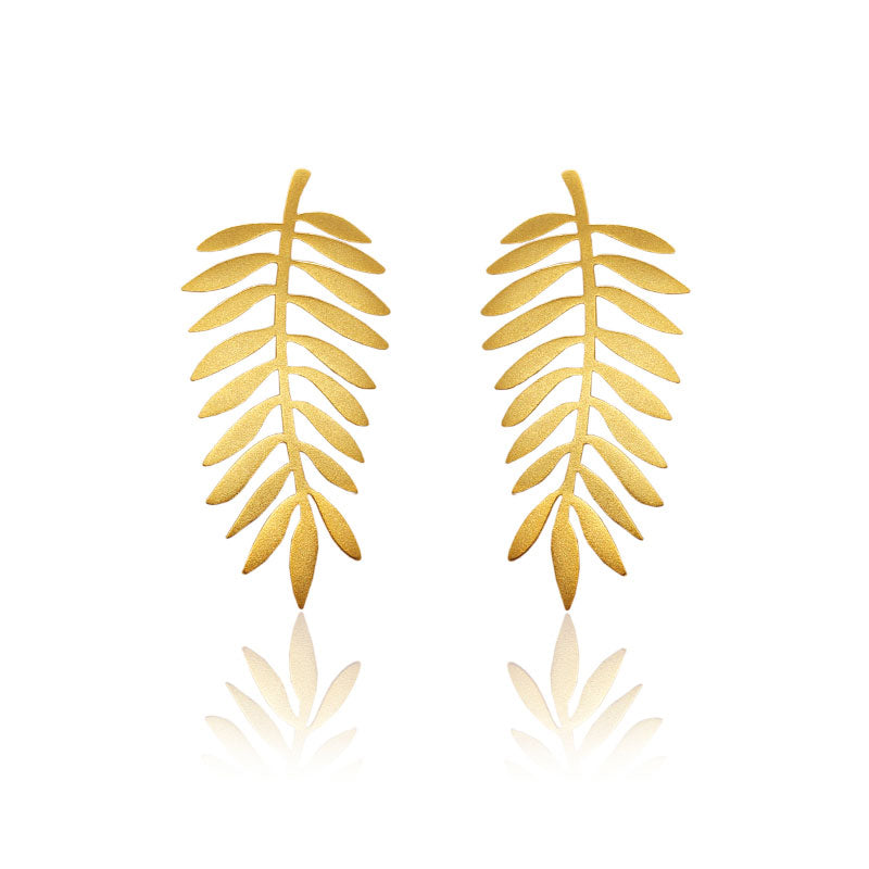 Palm Golden Earrings on a white background