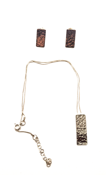 Necklace and earrings set with rectangular pendants on a white background