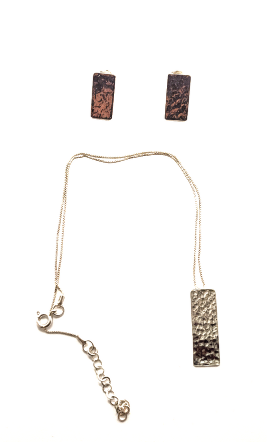 Necklace and earrings set with rectangular pendants on a white background