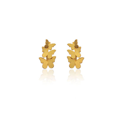 Triple Butterfly Gold earrings on a white background
