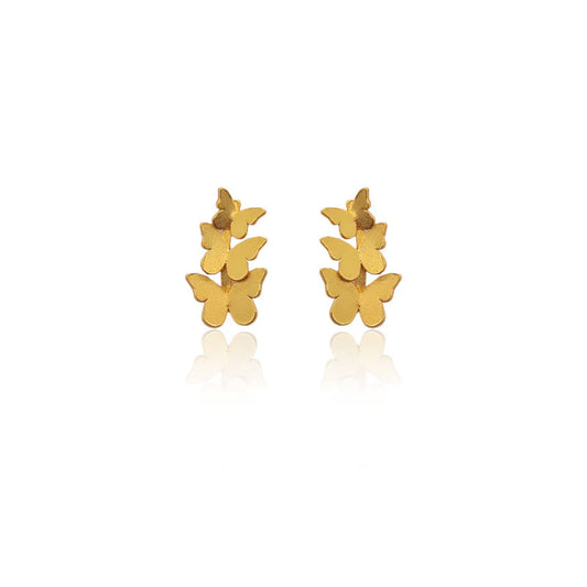 Triple Butterfly Gold earrings on a white background